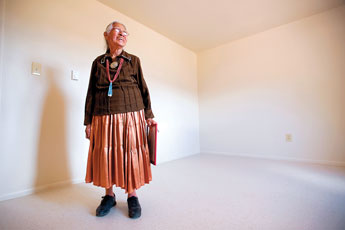 Eunice Wauneka smiles as she looks over the bedroom of her new home in fort Defiance Thursday. © 2011 Gallup Independent / Cable Hoover